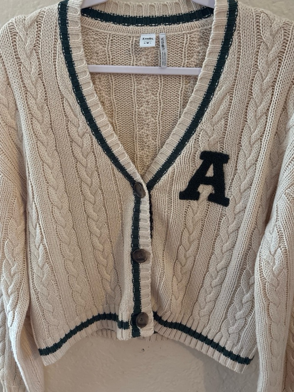 twik Cream Cable Knit Cardigan with Black Trim & A Patch